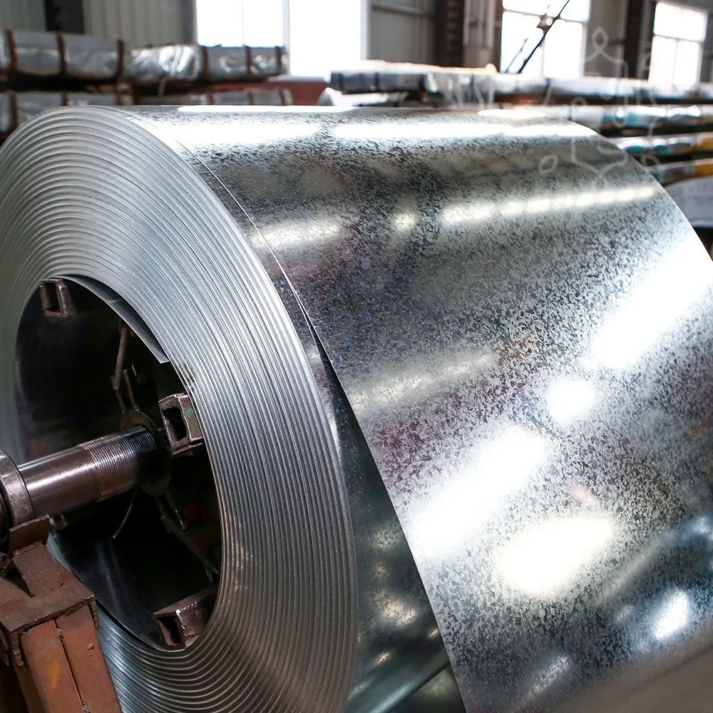 A roll of galvanized steel sits in a factory, showcasing its shiny surface and industrial setting